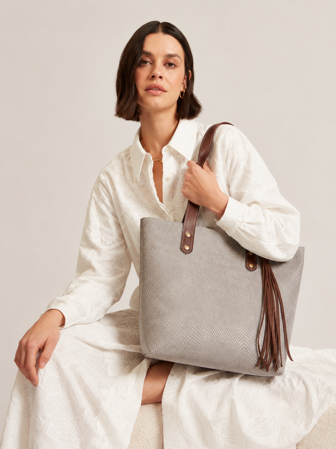Ivory Snake-Embossed Leather Bucket Tote with Fringe